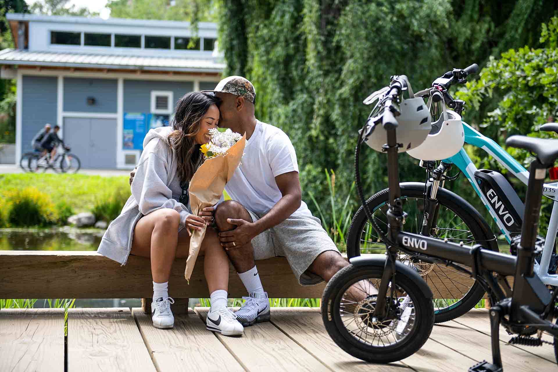 Valentines couple kissing with ebike